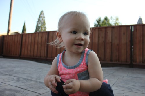 Claire and her adorable mullet in all of it's glory. To top it off, she had dirt smudged on her face from filling up Zoe's dog bowl with dirt. She's a happy girl. :)